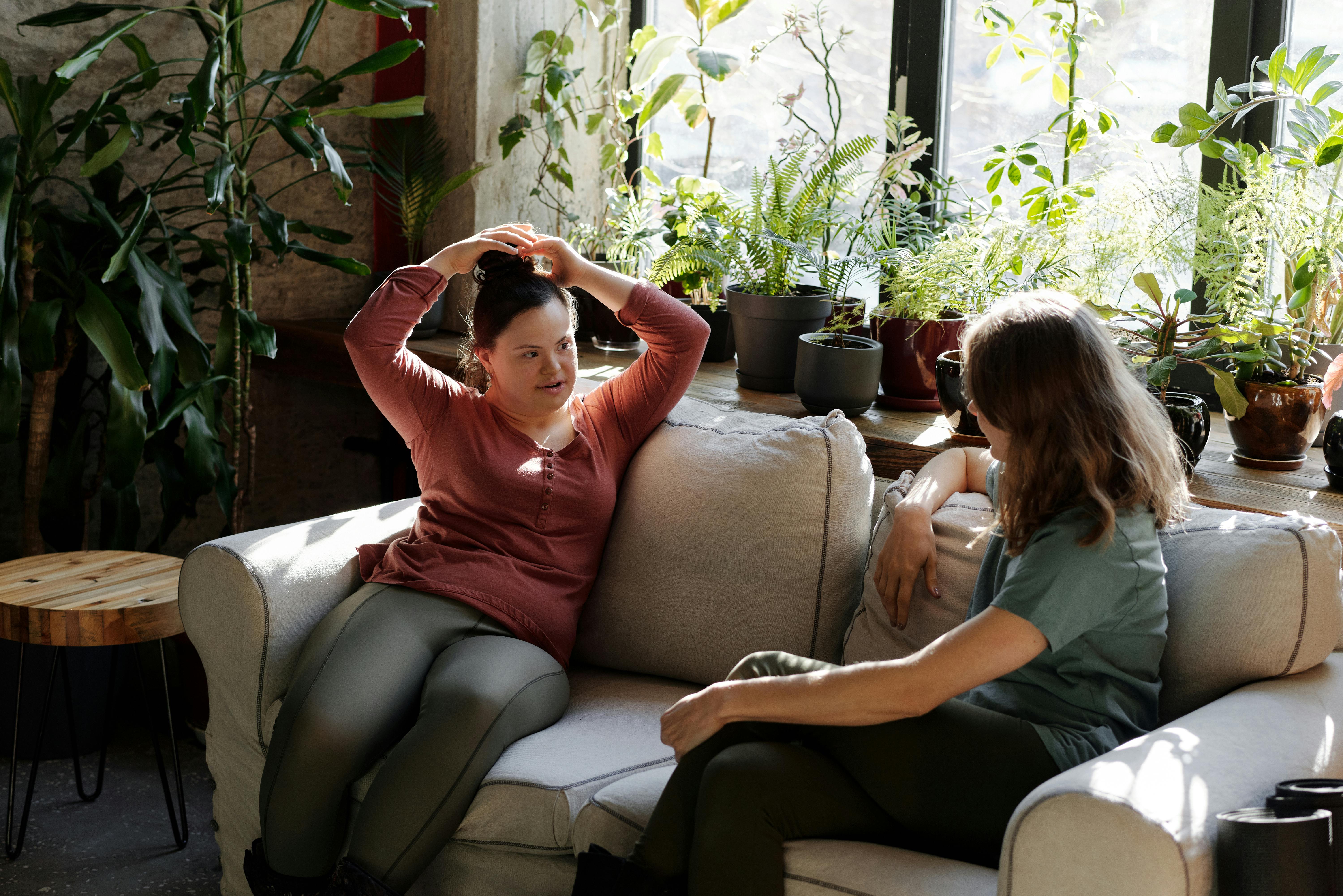 Support worker and participant talking together